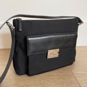 GUCCI Vintage black purse with silver detail!